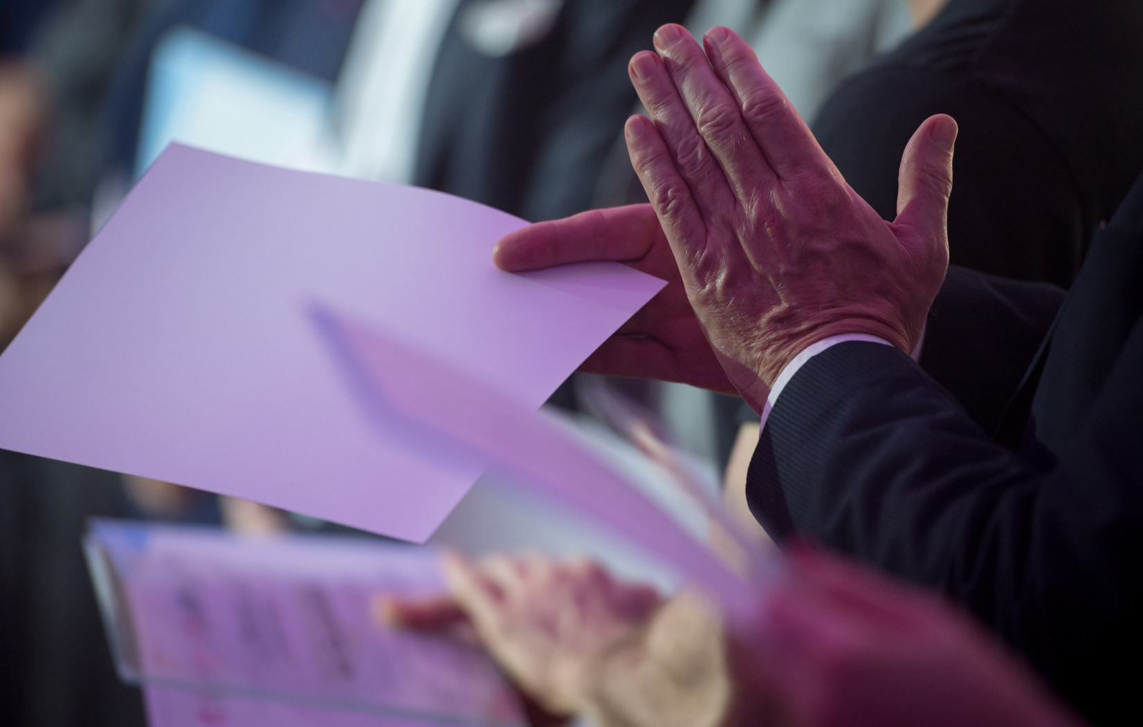 Applauding at awards ceremony